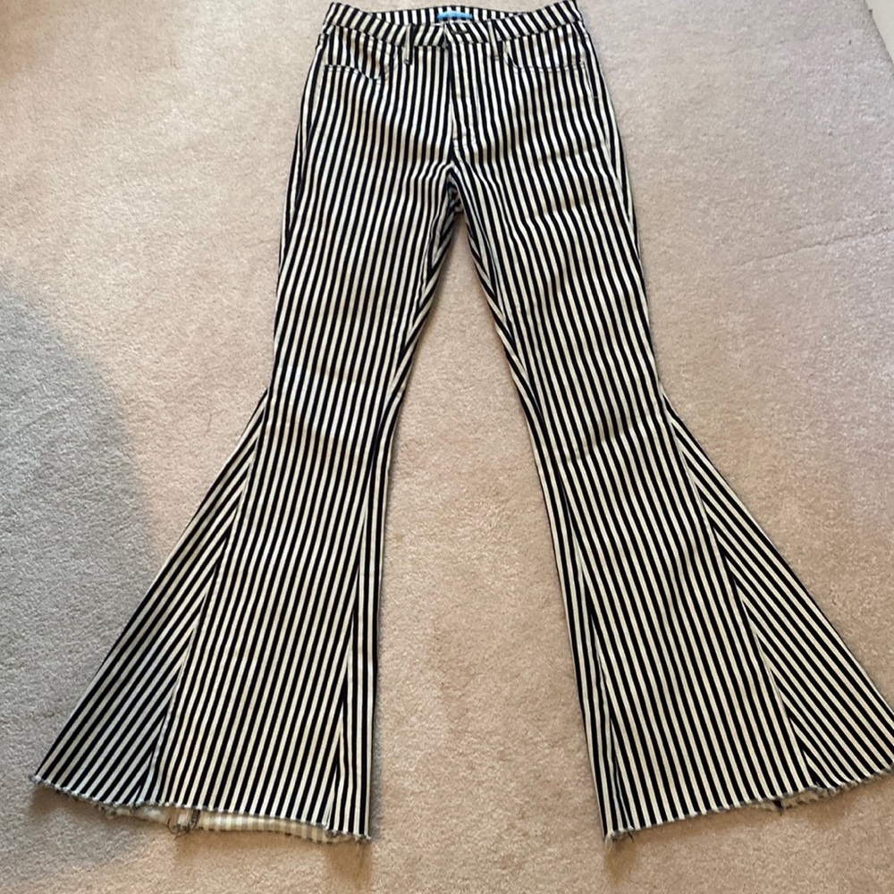 Black and white stripe flare jeans. Size 28. EUC.